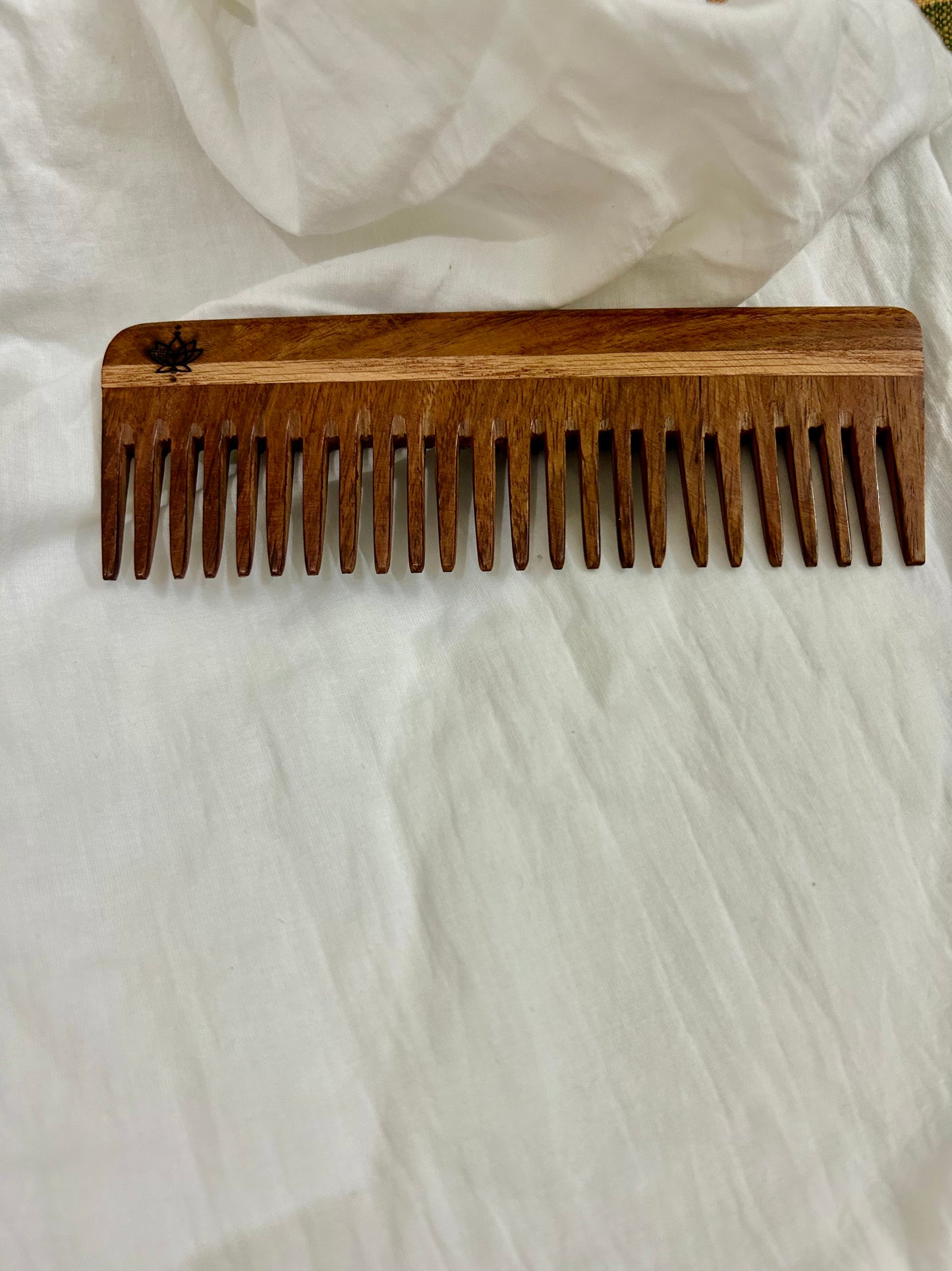 Wooden wide tooth comb